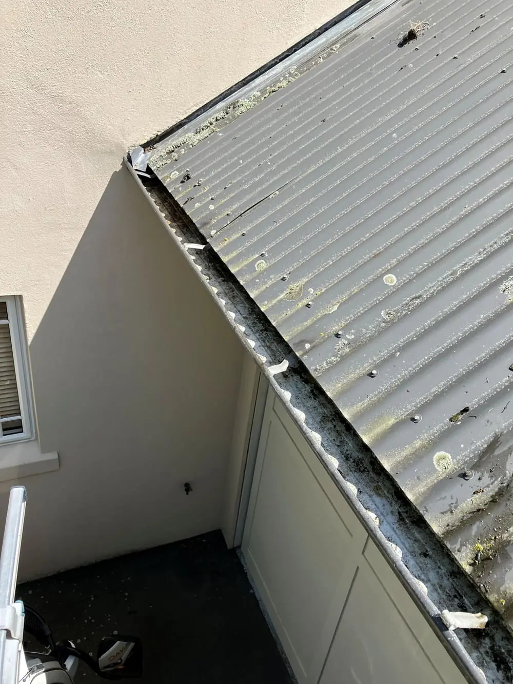 The same gutter completely cleared after vacuum cleaning