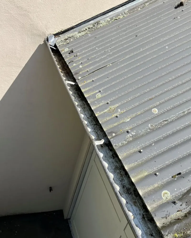 The same gutter completely cleared after vacuum cleaning