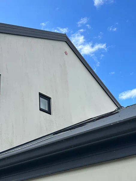 Plastered gable wall and roofline of a Christchurch home